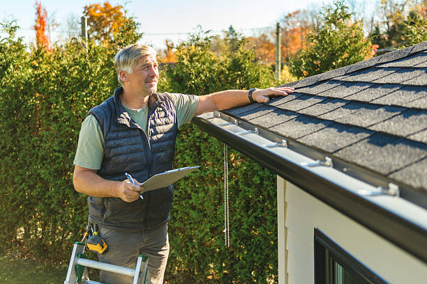 Professional Roof Replacement technician working in Manchester, MI